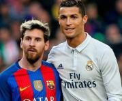 Lionel Messi y Cristiano Ronaldo durante un clásico de España